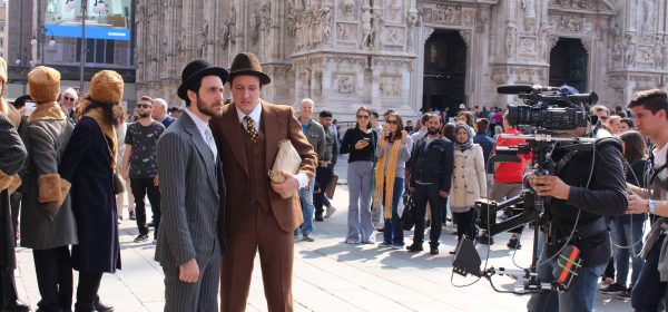 MILAN, ITALY - APRIL 15, 2017: Unidentified actors shooting a history film at Piazza del Duomo square in front of Milan Cathedral (Duomo di Milano).